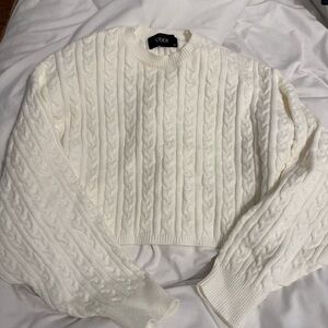 Cropped cable knit sweater